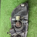Фара ліва (дефект зламане кріплення) Opel Zafira A (1999-2005) 89100054