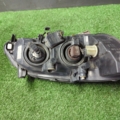 Фара ліва (дефект зламане кріплення) Opel Zafira A (1999-2005) 89100054