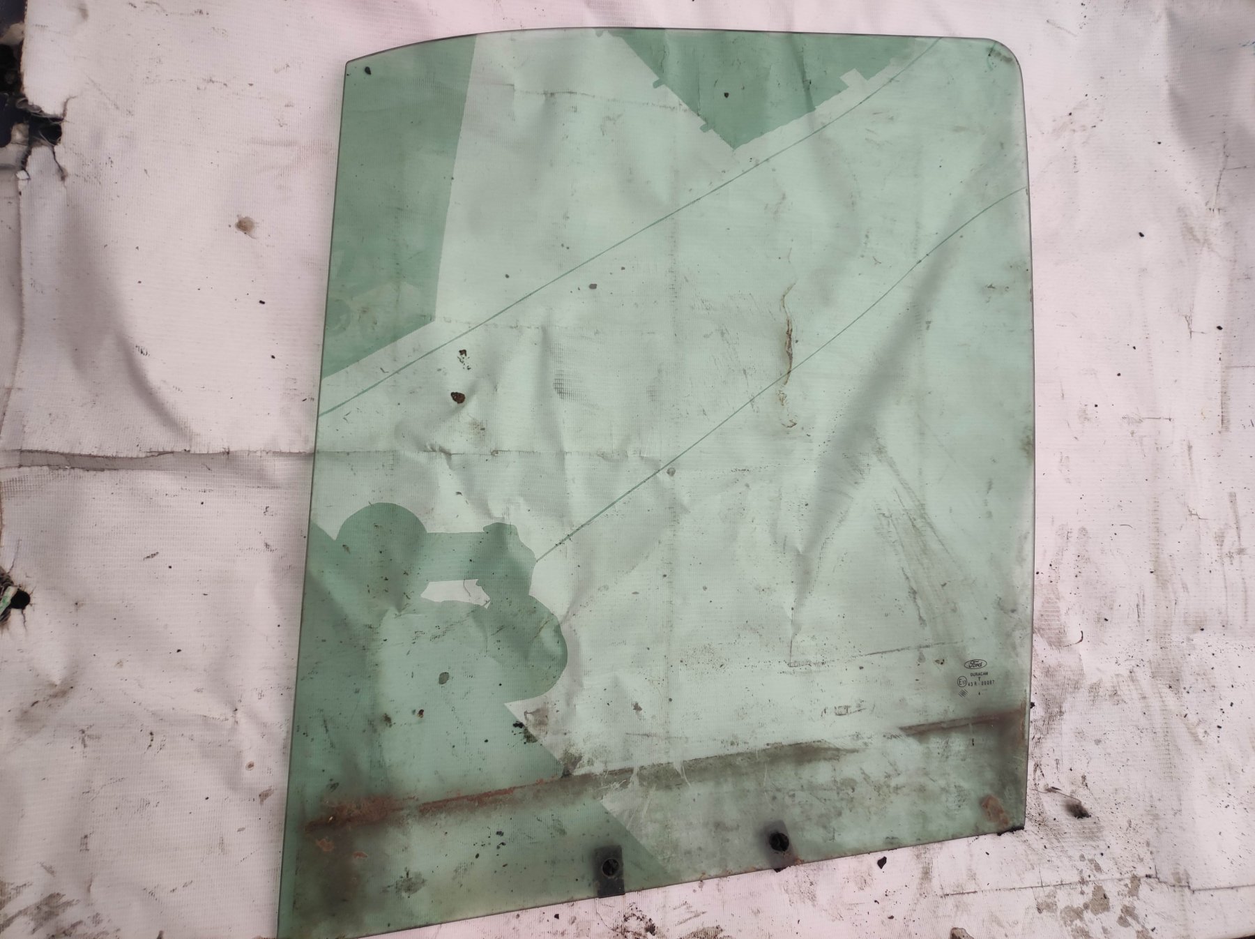 вікно (передніх дверей двері; Скло водійських дверей; Скло передніх дверей, лівих; Скло та ущільнювачі скла вітрового правого/лівого; Скло передніх дверей, лівою) Ford Transit Connect (2002-до тепер) 5049689