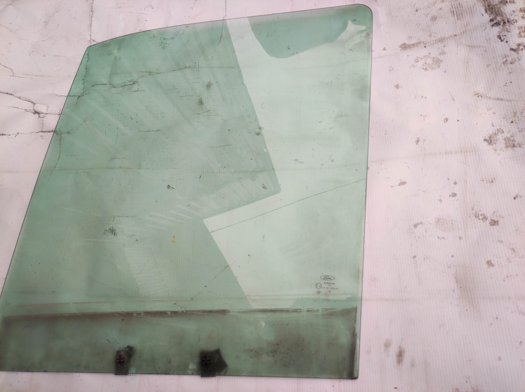 вікно (передніх дверей двері; Скло водійських дверей; Скло передніх дверей, лівих; Скло та ущільнювачі скла вітрового правого/лівого; Скло передніх дверей, лівою) Ford Transit Connect (2002-до тепер) 5049689