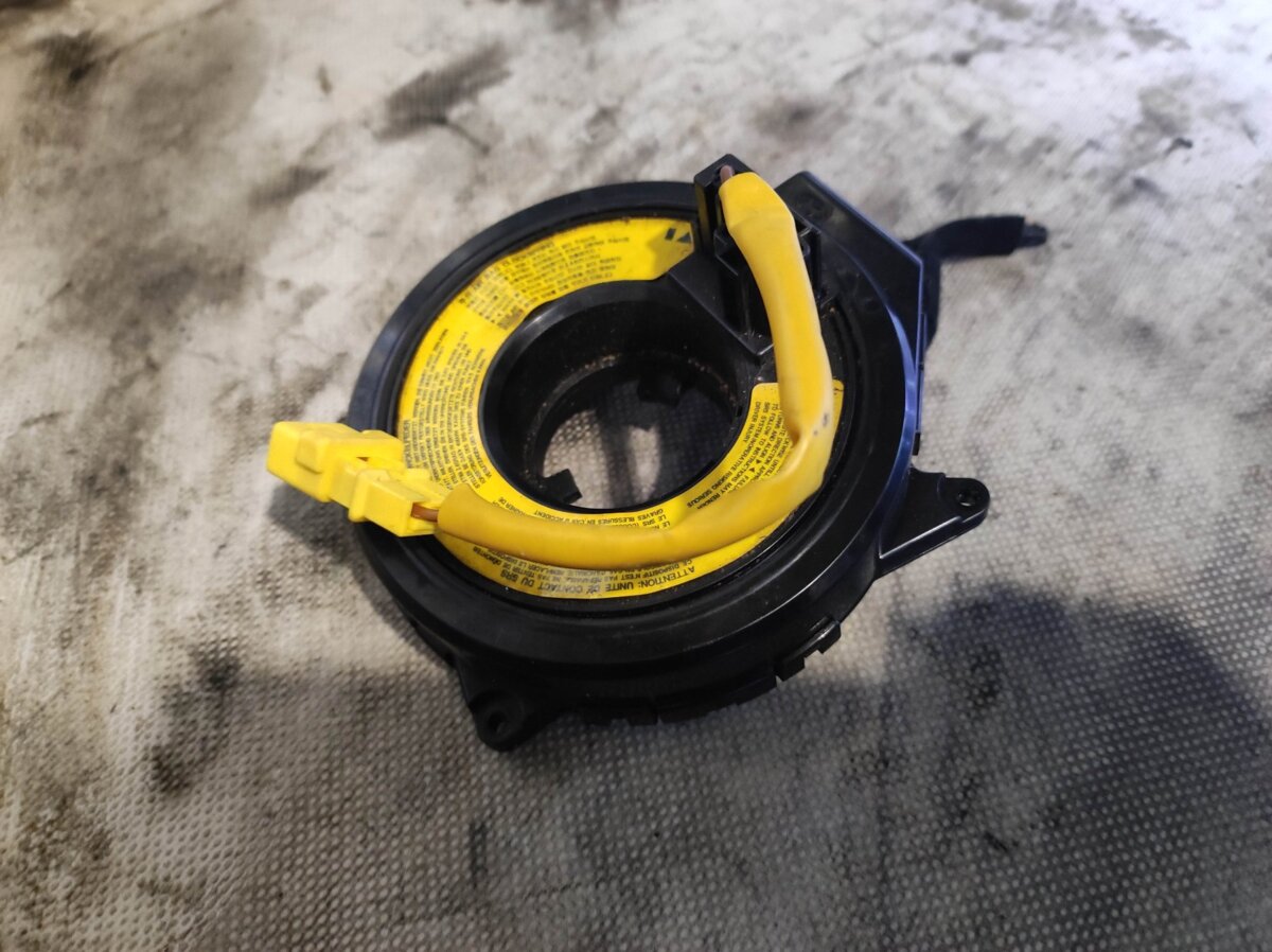 касета airbag; кільце айрбег контактне; кільце ейрбег контактне; кільце подушки безпеки; кільце рульового airbag; контактне кільце подушки безпеки; контактний блок подушки безпеки; підрульові контактна кільце; спіраль airbag; шлейф airbag; шлейф керма; кі