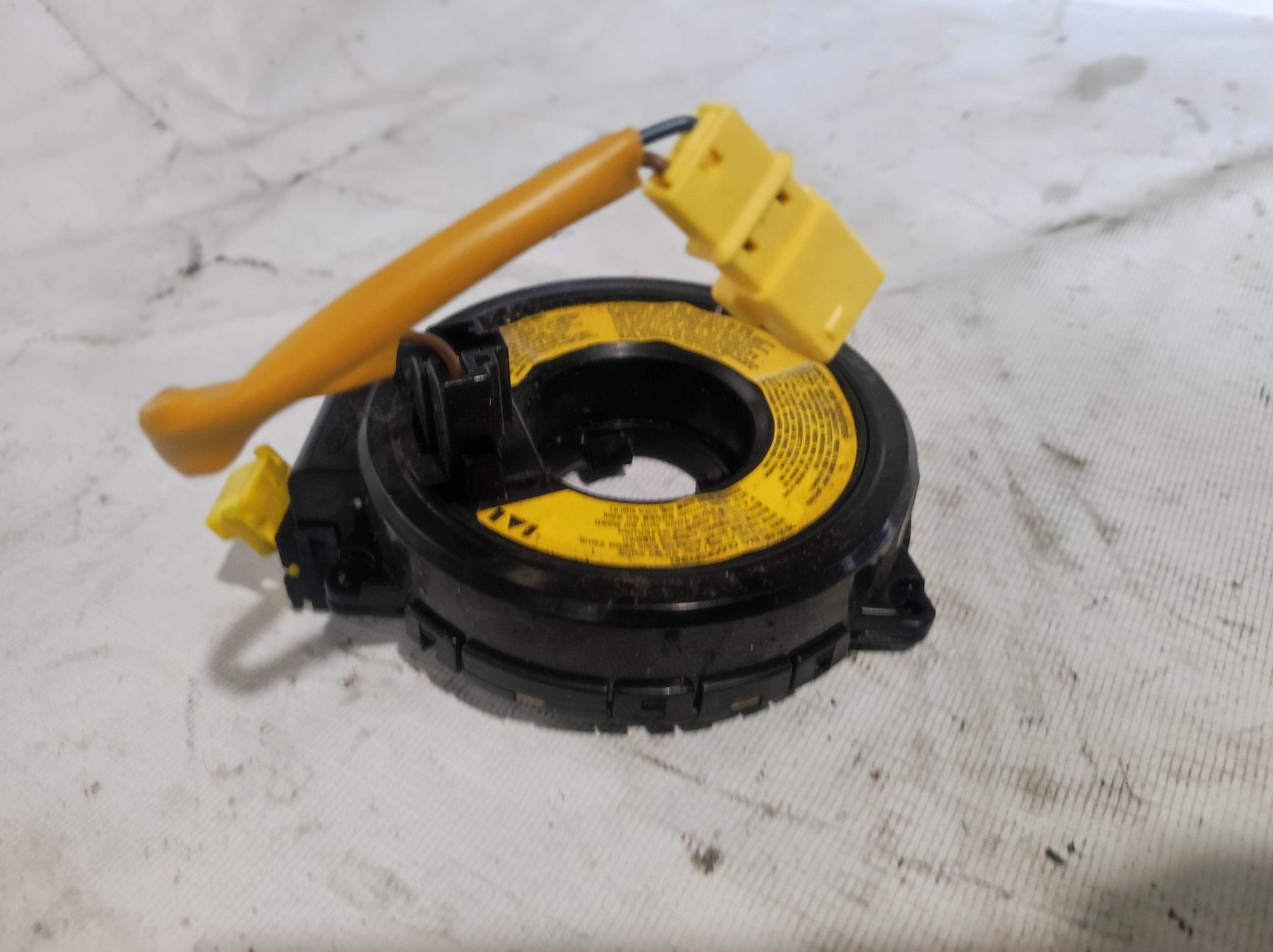 касета airbag; кільце айрбег контактне; кільце ейрбег контактне; кільце подушки безпеки; кільце рульового airbag; контактне кільце подушки безпеки; контактний блок подушки безпеки; підрульові контактна кільце; спіраль airbag; шлейф airbag; шлейф керма; кі