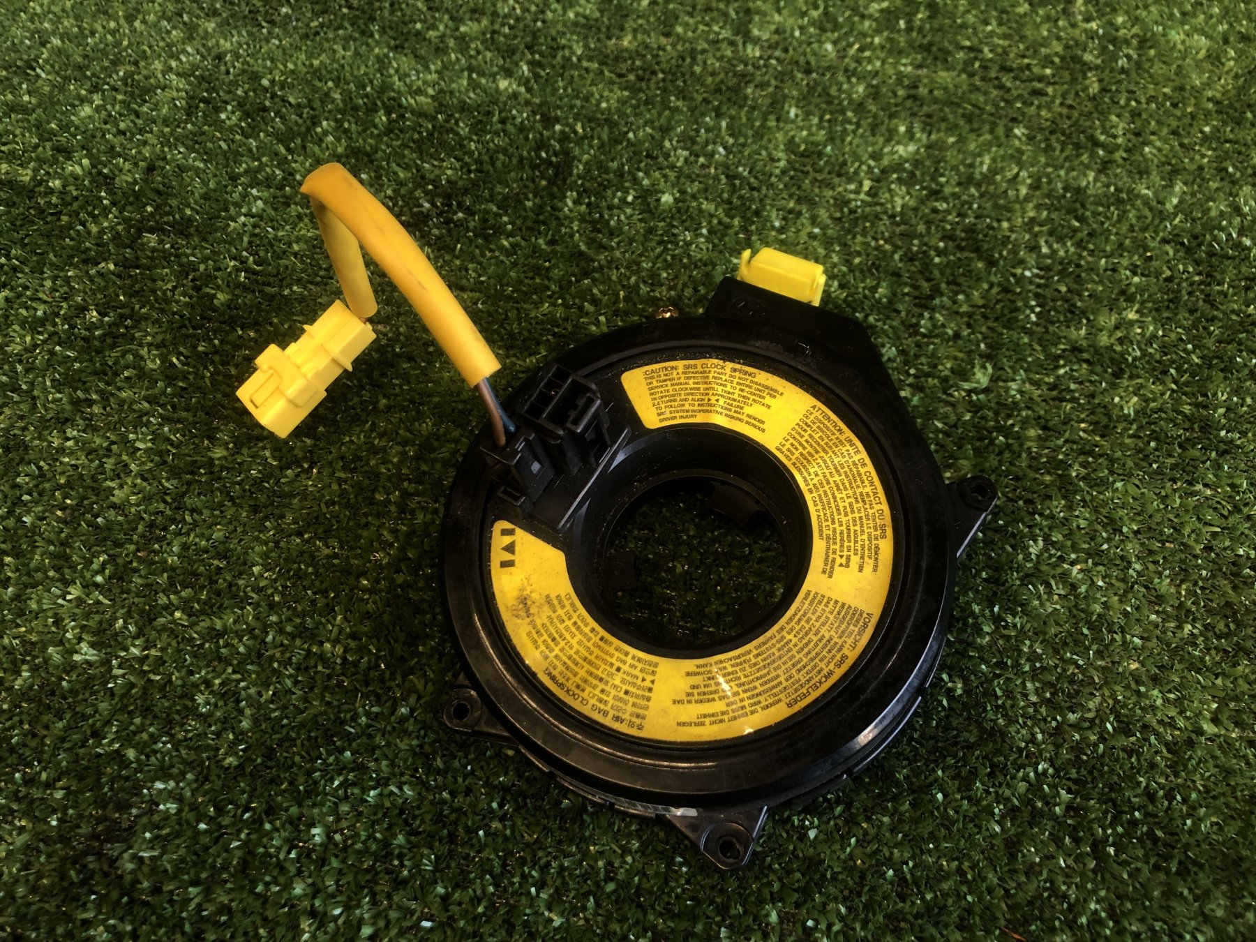 касета airbag; кільце айрбег контактне; кільце ейрбег контактне; кільце подушки безпеки; кільце рульового airbag; контактне кільце подушки безпеки; контактний блок подушки безпеки; підрульові контактна кільце; спіраль airbag; шлейф airbag; шлейф керма; кі