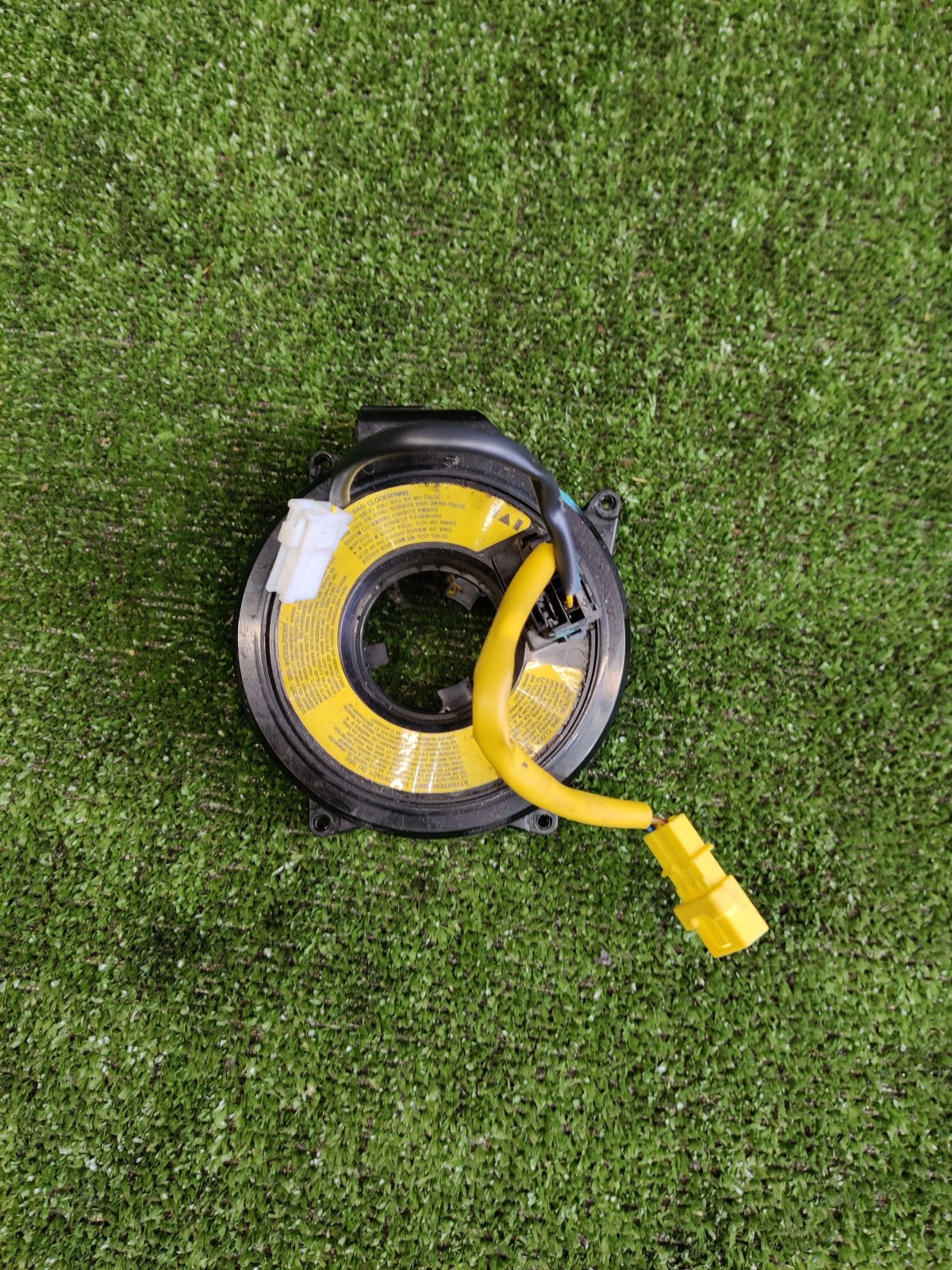 касета airbag; кільце айрбег контактне; кільце ейрбег контактне; кільце подушки безпеки; кільце рульового airbag; контактне кільце подушки безпеки; контактний блок подушки безпеки; підрульові контактна кільце; спіраль airbag; шлейф airbag; шлейф керма; кі