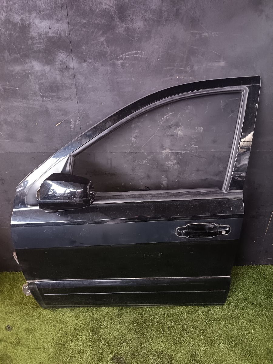 Двері передні ліві в зборі Kia Sorento JC (2002-2009) 760033E111 Вживаний