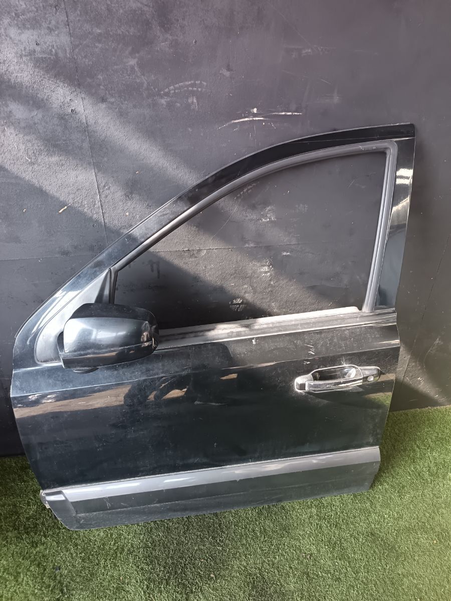 Двері передні ліві в зборі Kia Sorento JC (2002-2009) 760033E111