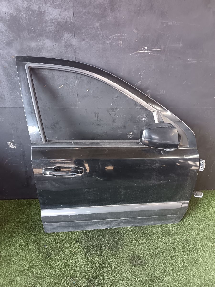 Двері передні праві Kia Sorento JC (2002-2009) 760043E111