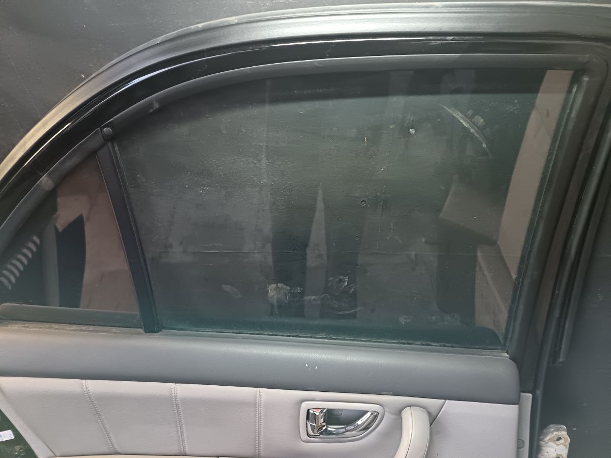 Двері задні, ліві Kia Sorento JC (2002-2009) 770033E111