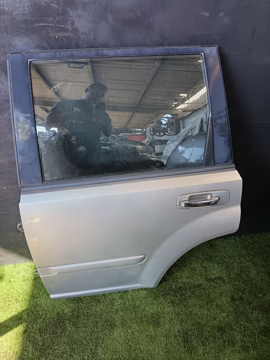 Дверь задня ліва Nissan X-Trail T30 (2001-2007) H21018H7MM