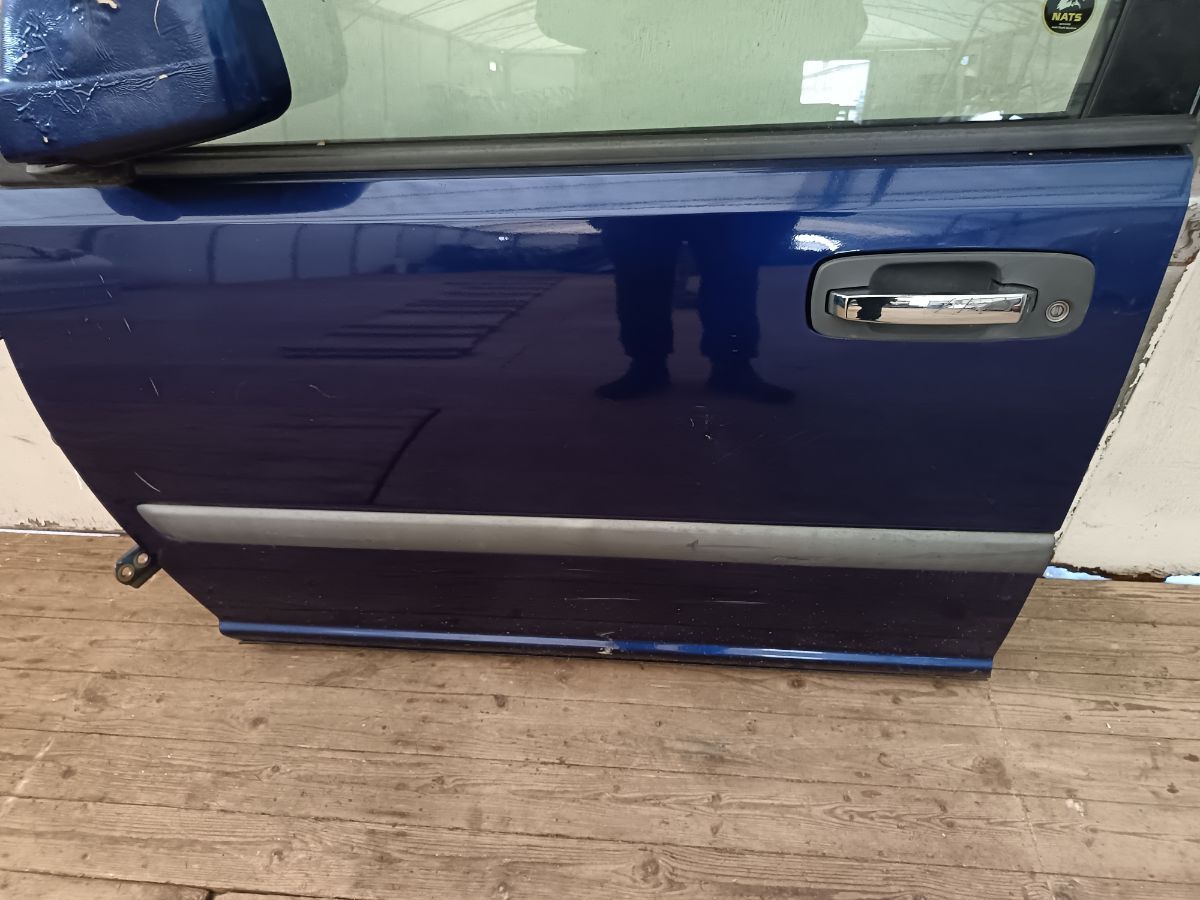 Двері передні ліві у зборі (розкомплектовано Nissan X-Trail T30 (2001-2007) H01018H7MM