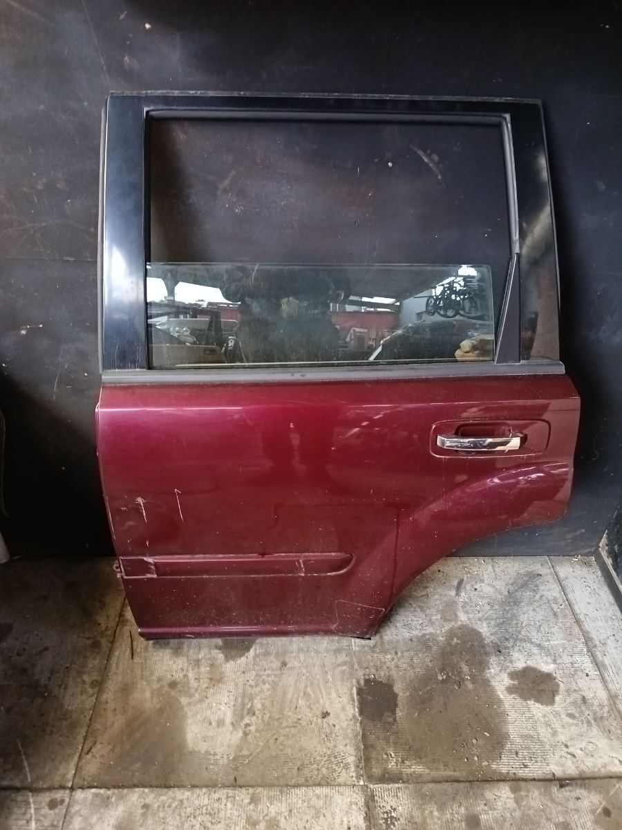 Двері задні ліві у зборі Nissan X-Trail T30 (2001-2007) H21018H7MM