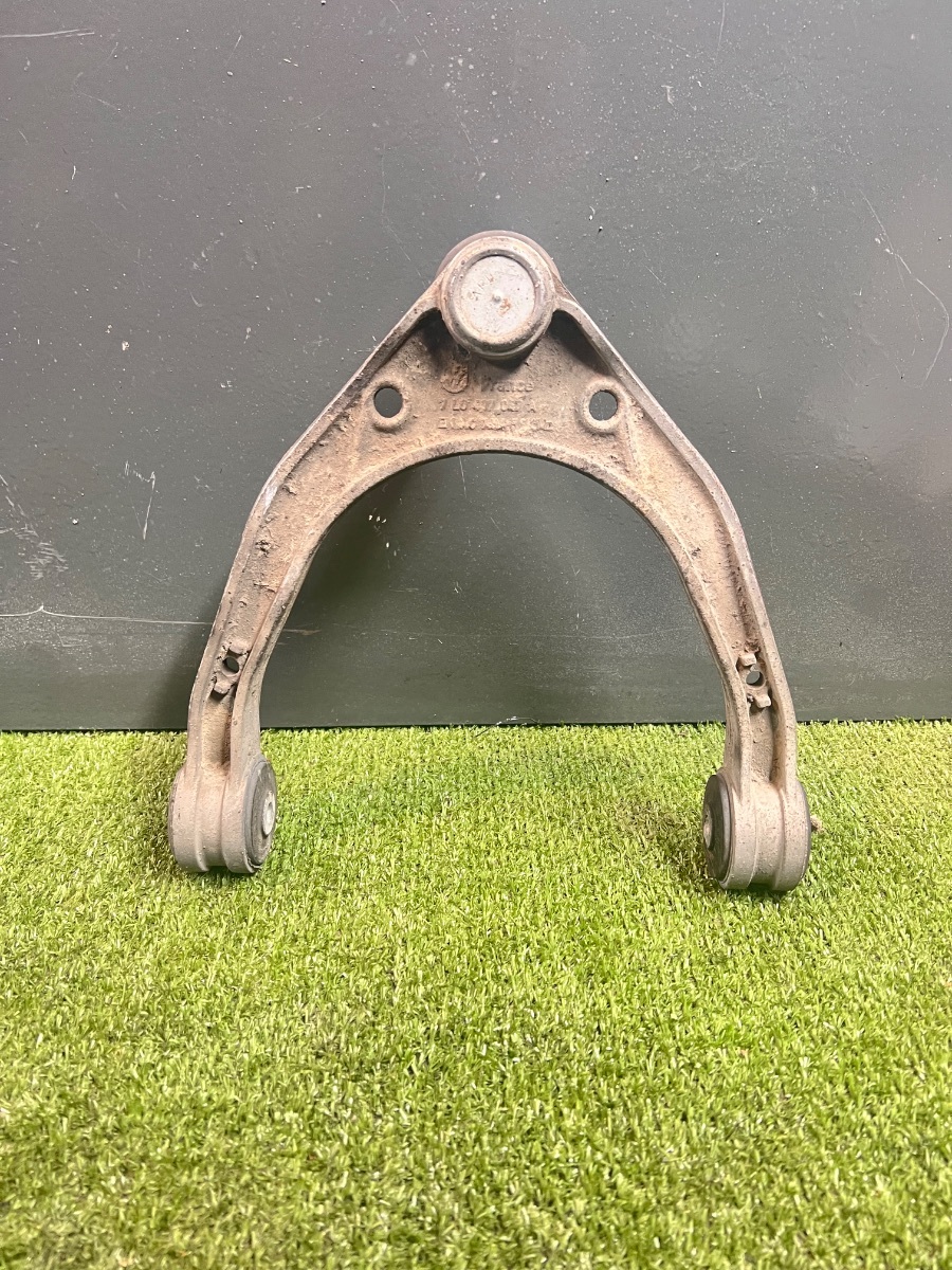 Важіль підвіски передній верхній лівий/правий Volkswagen Touareg I (2002-2010) 7L0407047A